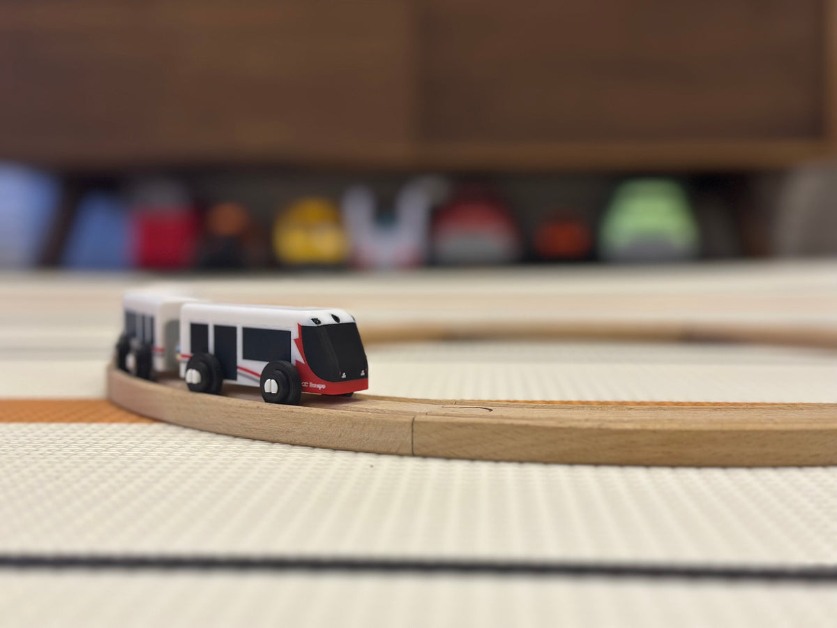 Ottawa O-Train toy streetcar on wooden Brio track